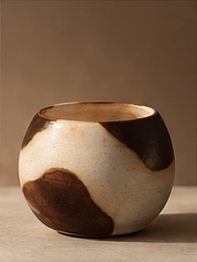 Rounded cream cup with brown glaze